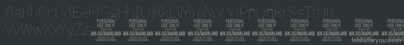 MainlandThin PERSONAL-fontti – harmaat kirjasimet mustalla taustalla