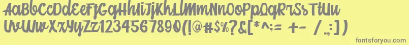 Шрифт Mainstream Script – серые шрифты на жёлтом фоне