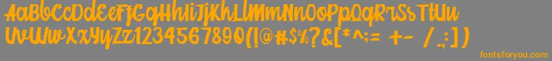 Weitere Informationen zur Mainstream Script-Schriftart Mainstream Script-Schriftart – Orangefarbene Schriften auf grauem Hintergrund