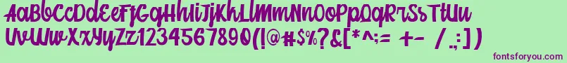 Mainstream Script-fontti – violetit fontit vihreällä taustalla