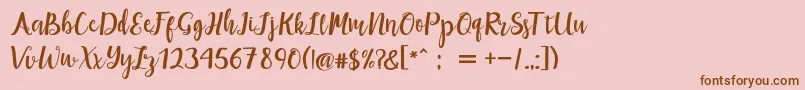 maisha script Demo Font – Brown Fonts on Pink Background