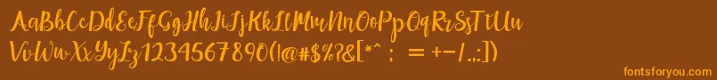 maisha script Demo-Schriftart – Orangefarbene Schriften auf braunem Hintergrund