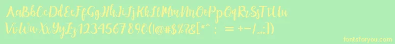 maisha script Demo Font – Yellow Fonts on Green Background