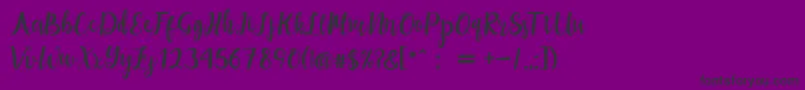 maisha script Demo-Schriftart – Schwarze Schriften auf violettem Hintergrund