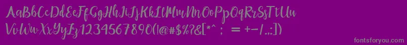 maisha script Demo-Schriftart – Graue Schriften auf violettem Hintergrund