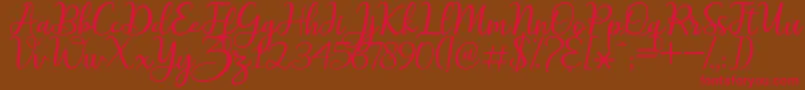 maitlyn script2 Font – Red Fonts on Brown Background