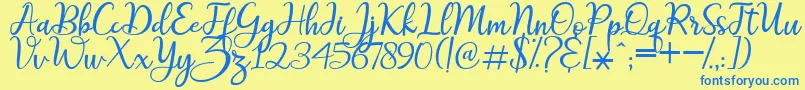 maitlyn script2-fontti – siniset fontit keltaisella taustalla