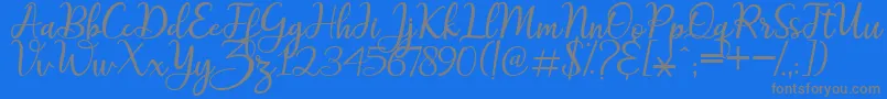 maitlyn script2-Schriftart – Graue Schriften auf blauem Hintergrund