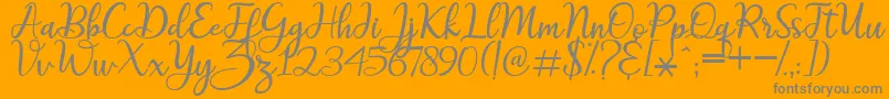 Czcionka maitlyn script2 – szare czcionki na pomarańczowym tle