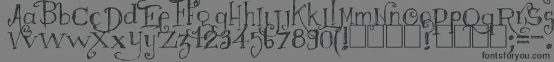 Majestrick Font – Black Fonts on Gray Background