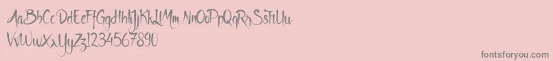 Godfeem-Schriftart – Graue Schriften auf rosa Hintergrund