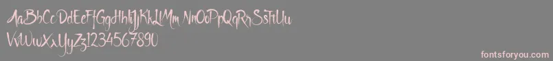 Godfeem-Schriftart – Rosa Schriften auf grauem Hintergrund
