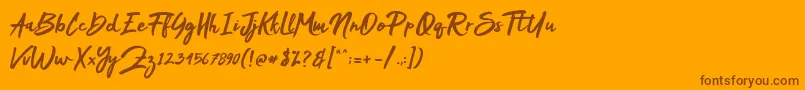 Mak Dah Font – Brown Fonts on Orange Background