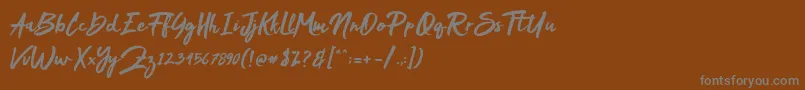 Mak Dah Font – Gray Fonts on Brown Background