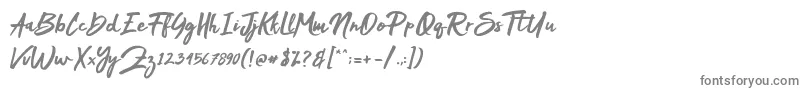 フォントMak Dah – 白い背景に灰色の文字