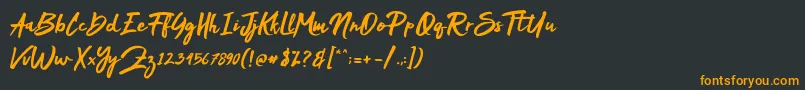 Mak Dah Font – Orange Fonts on Black Background