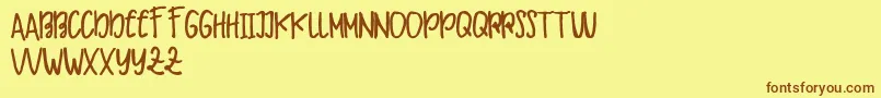 Makaw Free Font – Brown Fonts on Yellow Background