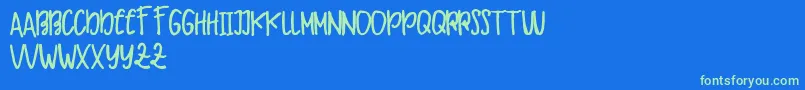 Makaw Free-Schriftart – Grüne Schriften auf blauem Hintergrund