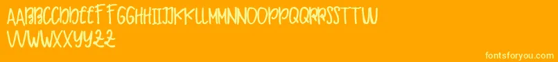 Makaw Free Font – Yellow Fonts on Orange Background