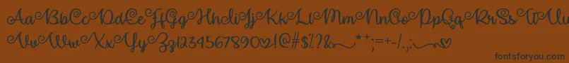 Make Magic Happen   Font – Black Fonts on Brown Background