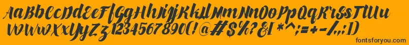 makinglovem Font – Black Fonts on Orange Background