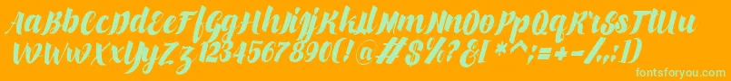 makinglovem Font – Green Fonts on Orange Background
