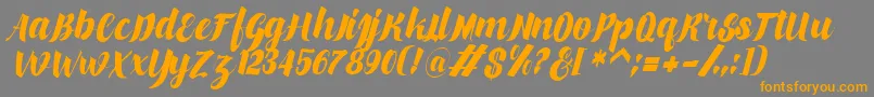 makinglovem Font – Orange Fonts on Gray Background