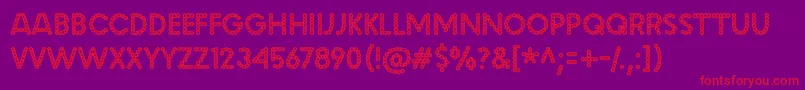 malache crunch-Schriftart – Rote Schriften auf violettem Hintergrund