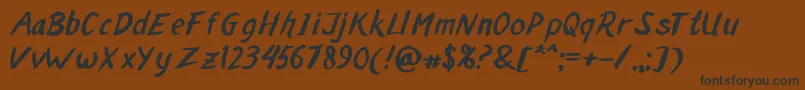 フォントMALAKA BRUSH – 黒い文字が茶色の背景にあります