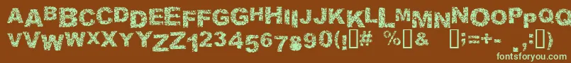 フォントMALAPROPISM – 緑色の文字が茶色の背景にあります。