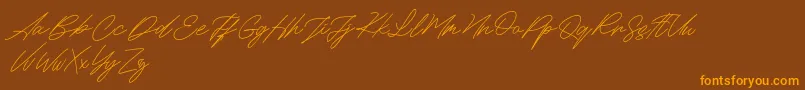 Maldins FREE-Schriftart – Orangefarbene Schriften auf braunem Hintergrund