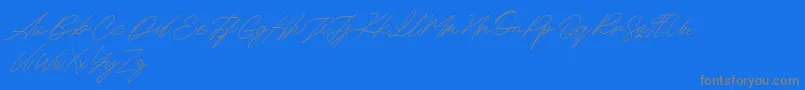 Maldins FREE-Schriftart – Graue Schriften auf blauem Hintergrund