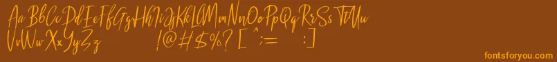 Malenna DEMO Font – Orange Fonts on Brown Background