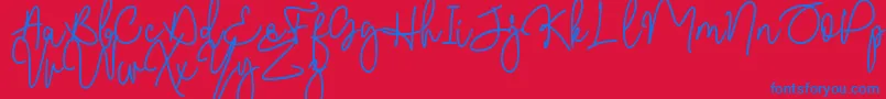 Malibbie DAFONT-Schriftart – Blaue Schriften auf rotem Hintergrund
