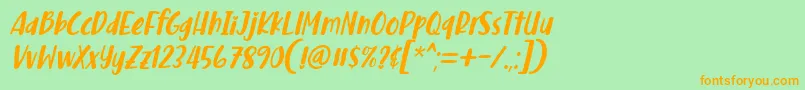 フォントMalove Font Italic by 7NTypes D – オレンジの文字が緑の背景にあります。