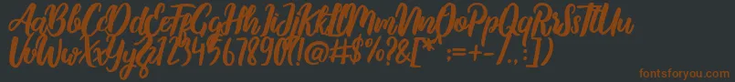 Шрифт MalykaDemo – коричневые шрифты на чёрном фоне