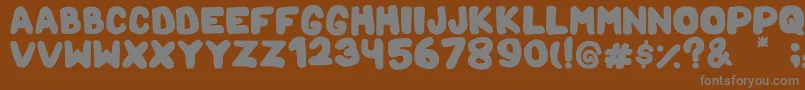 フォントMamaBear – 茶色の背景に灰色の文字