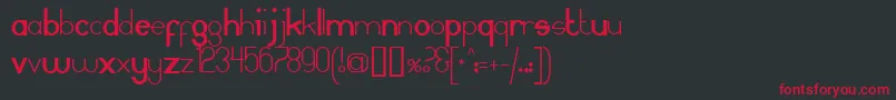 MAMMAGAMMA-Schriftart – Rote Schriften auf schwarzem Hintergrund