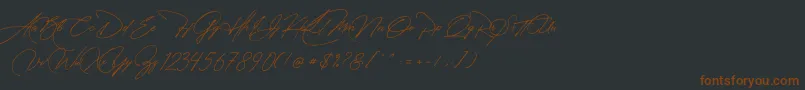 Manchester Signature-fontti – ruskeat fontit mustalla taustalla