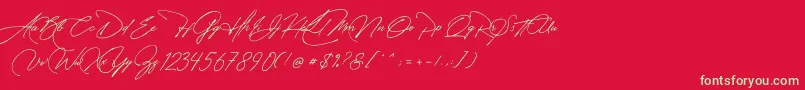 フォントManchester Signature – 赤い背景に緑の文字
