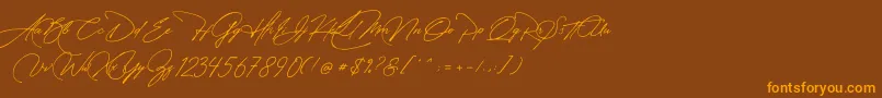 Manchester Signature-Schriftart – Orangefarbene Schriften auf braunem Hintergrund