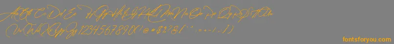 Manchester Signature-fontti – oranssit fontit harmaalla taustalla