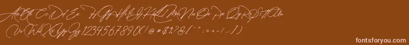 Manchester Signature-fontti – vaaleanpunaiset fontit ruskealla taustalla