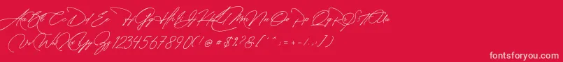 フォントManchester Signature – 赤い背景にピンクのフォント