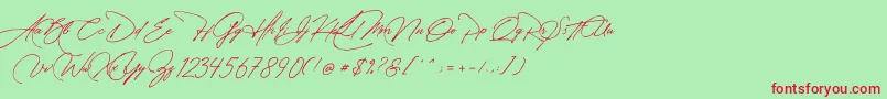 フォントManchester Signature – 赤い文字の緑の背景