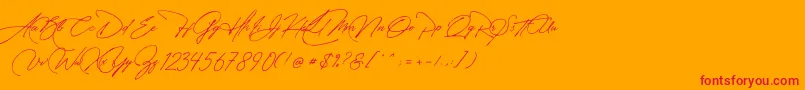 フォントManchester Signature – オレンジの背景に赤い文字