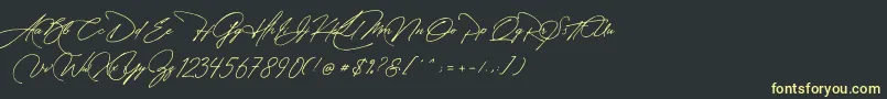 フォントManchester Signature – 黒い背景に黄色の文字
