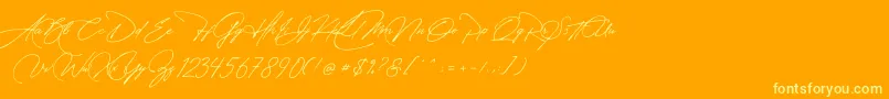 Manchester Signature-Schriftart – Gelbe Schriften auf orangefarbenem Hintergrund