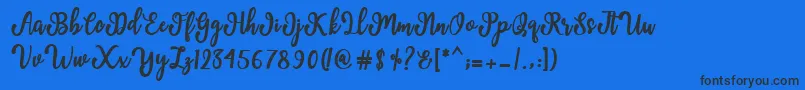 Fonte Manda Script – fontes pretas em um fundo azul