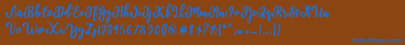 Шрифт Manda Script – синие шрифты на коричневом фоне